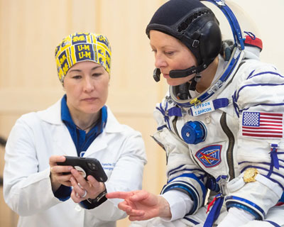 UTMB's Natacha Chough, MD, MPH, pictured left  (NASA/GCTC/A. Shelepin)