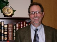David M Adams, PhD, MLS